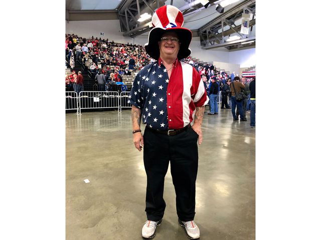 Trump supporter Rob Dous, in a stars-and-stripes shirt and top hat